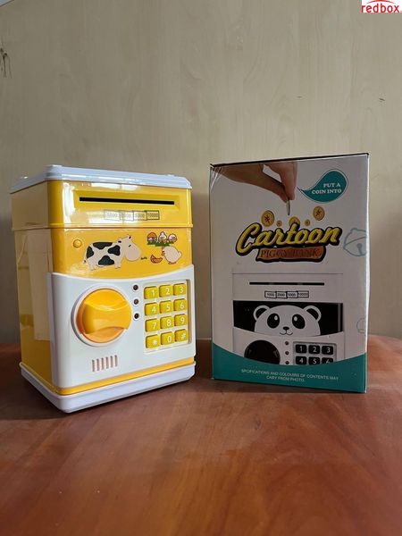 Скарбничка сейф дитяча інтерактивна іграшка Жовта Корова з кодовим замком Cartoon cow cow1913 фото